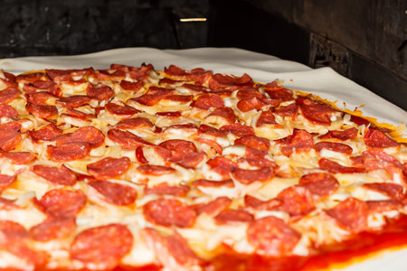Pizza. Homemade pizza. Delicious pizza. Freshly made Italian margherita pizza with buffalo mozzarella and basil. Pizza with cheese, tomato sauce. Wood oven. World Pizza Day. Februaの素材