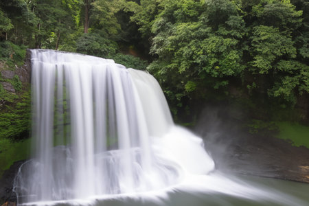Waterfall. Majestic waterfall. Panoramic beautiful deep forest waterfall. Fantasy landscape with...