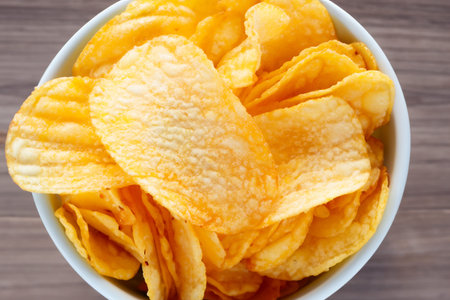 Chips. Potato chips levitate on a white background. Natural potato chips isolated. Potato chips...