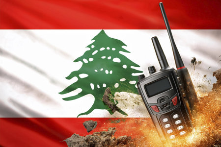 Walkie talkies. Lebanon flag. Explosion in portable radios.の写真素材