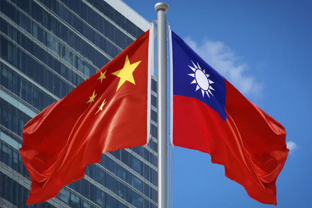 China VS Taiwan. Chinese flag. Taiwan flag. Joint flags due to the party confrontation that both have. Football game. Conflict between both countries that could escalate into war.の写真素材