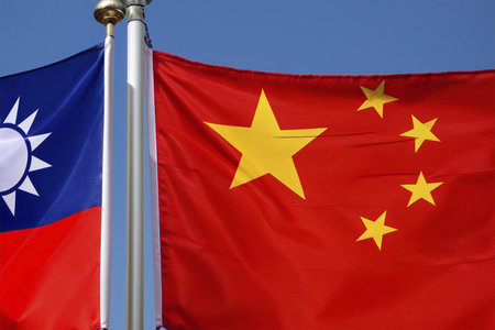 China and Taiwan flags displayed together. The Chinese flag and the Taiwan flag are shown side by side.の写真素材