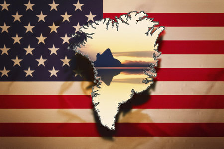 Greenland. Silhouette of Greenland island on a map. USA flag in the background.の写真素材