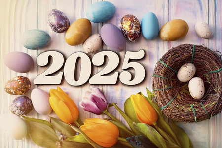 Easter. 2025. Easter landscape, colorful eggs and daisy flower on the meadow under beautiful sky. 3d...