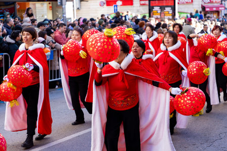 Happy Chinese New Year. 2025. Chinese lion dance performance on the streets. Chinese lion costumes...