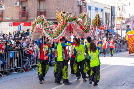 Happy Chinese New Year. 2025. Chinese lion dance performance on the streets. Chinese lion costumes during Chinese New Year celebration in China. celebrations concept.の写真素材