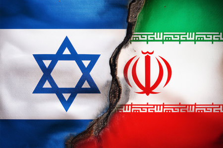 Israel and Iran face off in a conflict that intensifies with attacks launched from Tel Aviv and Herzliya, generating regional and international concernの写真素材