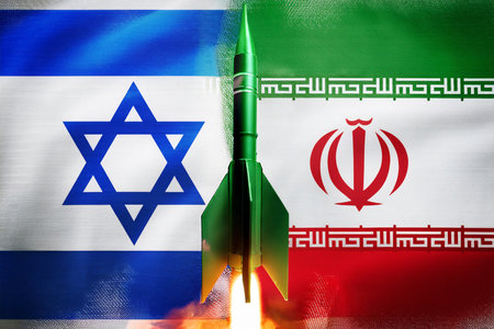 Israel and Iran face off in a conflict that intensifies with attacks launched from Tel Aviv and Herzliya, generating regional and international concernの写真素材