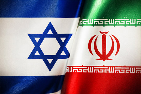 Israel and Iran face off in a conflict that intensifies with attacks launched from Tel Aviv and Herzliya, generating regional and international concernの写真素材