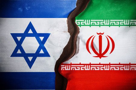 Israel and Iran face off in a conflict that intensifies with attacks launched from Tel Aviv and Herzliya, generating regional and international concernの写真素材