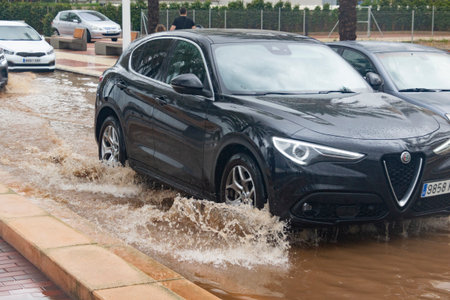 Floods in Spain caused by intense rain storm and DANA. Torrential rain and storm cause flooding in several regions. July 2025の写真素材