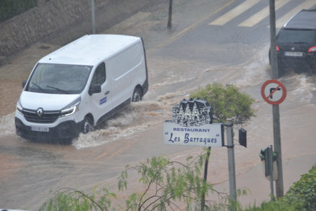 Floods in Spain caused by intense rain storm and DANA. Torrential rain and storm cause flooding in several regions. July 2025の写真素材