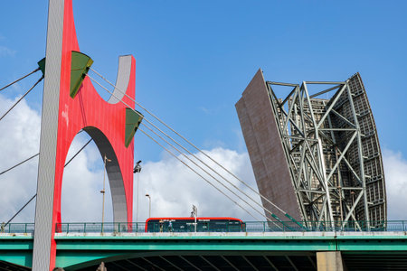 Guggenheim Museum Bilbao and Iconic Artworks on a Sunny Dayの写真素材