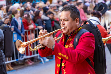 Chinese citizens celebrating Lunar New Year in the streets during public festivities marking the...