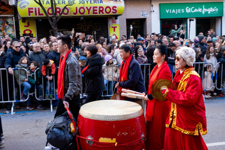 Chinese citizens celebrating Lunar New Year in the streets during public festivities marking the...