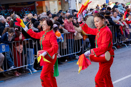 Chinese citizens celebrating Lunar New Year in the streets during public festivities marking the...