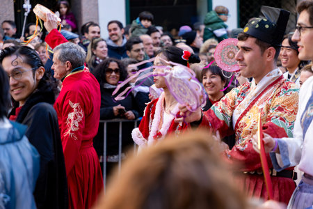 Chinese citizens celebrating Lunar New Year in the streets during public festivities marking the...