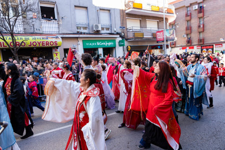 Chinese citizens celebrating Lunar New Year in the streets during public festivities marking the...