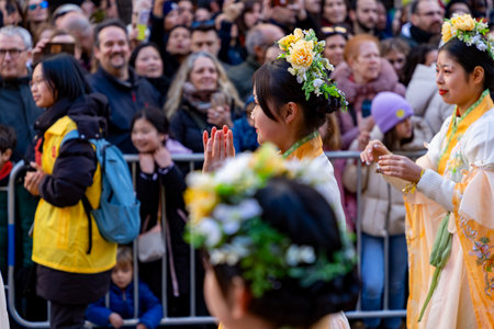 Chinese citizens celebrating Lunar New Year in the streets during public festivities marking the Year of the Horse in 2026. Cultural tradition and community event.のeditorial素材