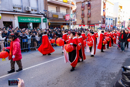 Chinese citizens celebrating Lunar New Year in the streets during public festivities marking the...
