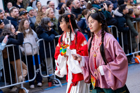 Chinese citizens celebrating Lunar New Year in the streets during public festivities marking the...