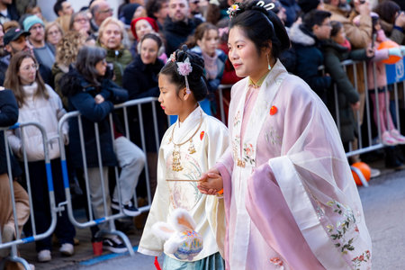 Chinese citizens celebrating Lunar New Year in the streets during public festivities marking the...