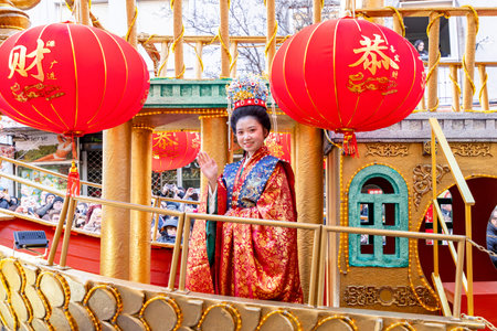 Chinese citizens celebrating Lunar New Year in the streets during public festivities marking the...