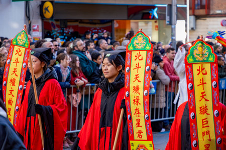 Chinese citizens celebrating Lunar New Year in the streets during public festivities marking the...