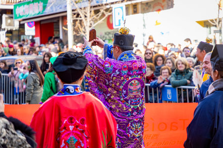 Chinese citizens celebrating Lunar New Year in the streets during public festivities marking the...