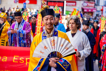 Chinese citizens celebrating Lunar New Year in the streets during public festivities marking the...