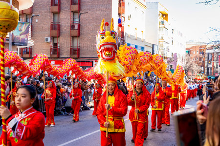 Chinese citizens celebrating Lunar New Year in the streets during public festivities marking the Year of the Horse in 2026. Cultural tradition and community event.のeditorial素材