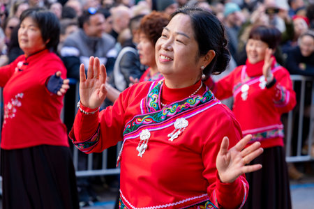 Chinese citizens celebrating Lunar New Year in the streets during public festivities marking the Year of the Horse in 2026. Cultural tradition and community event.のeditorial素材