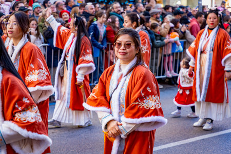 Chinese citizens celebrating Lunar New Year in the streets during public festivities marking the Year of the Horse in 2026. Cultural tradition and community event.のeditorial素材