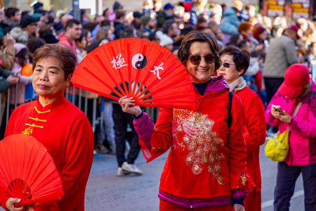 Chinese citizens celebrating Lunar New Year in the streets during public festivities marking the Year of the Horse in 2026. Cultural tradition and community event.のeditorial素材