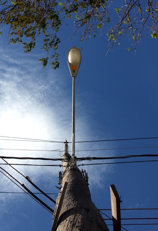 An electric post with a single lamp の写真素材