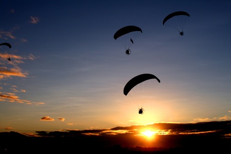 An early morning paragliding by the participants of the Annual Hot Air Balloon Fiesta in Angeles, Pampangga, Philippines のeditorial素材