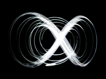 white spiral of eight isolated on dark background