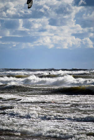 Kitboarder in stormy sea during sport eventの写真素材