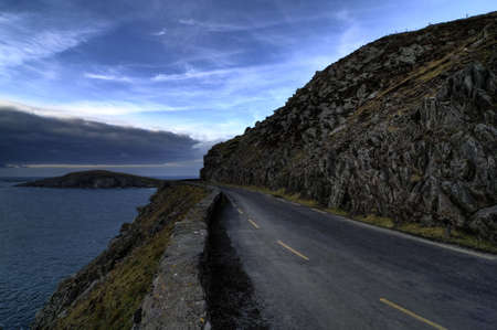 Sunset on the road in Dingle peninsula coastlineの写真素材
