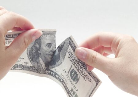 ripping one hundred dollars の写真素材