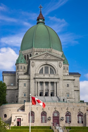 St.Joseph Oratory with Canadian flag in front of it, Montreal, Canadaの写真素材
