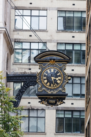 An old London street clock, London, UKの写真素材