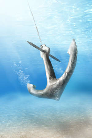photo of Anchor being droped underwaterの写真素材