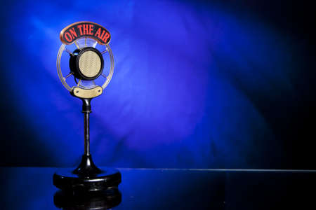 radio microphone on blue backgroundの写真素材
