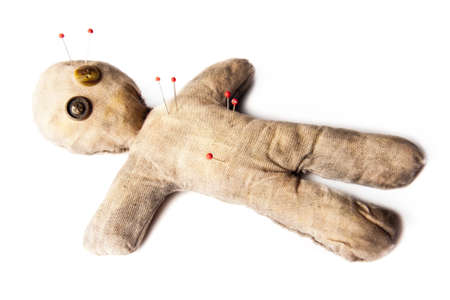 photo of creepy voodoo doll isolated on whiteの写真素材