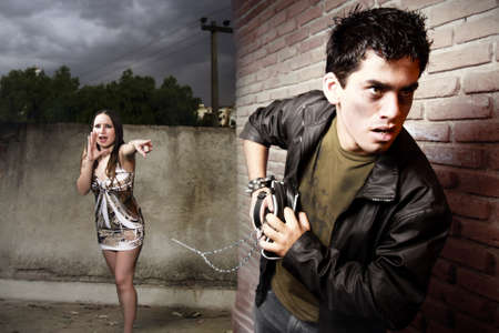 thief and woman on alleyの写真素材