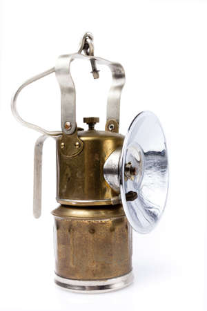 golden mining lamp on a white backgroundの写真素材