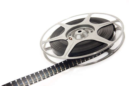 reel of 8mm motion picture film on whiteの写真素材