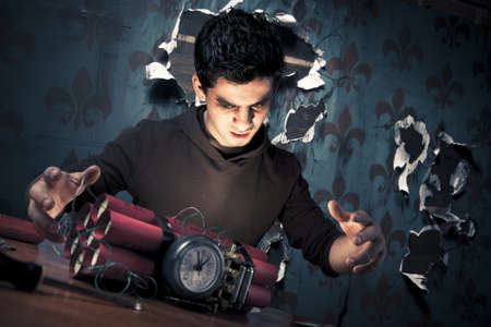 high contrast image of a terrorist making a timebombの写真素材