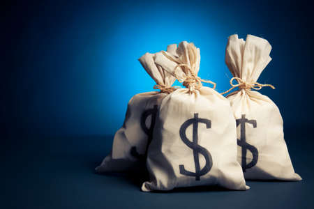 lots of money inside bagsの写真素材